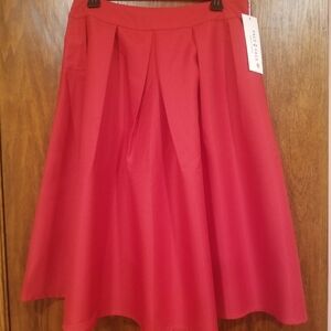 Pleated skirt with pockets